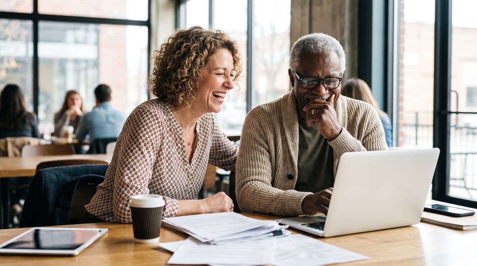 An owner and her accountant review the numbers